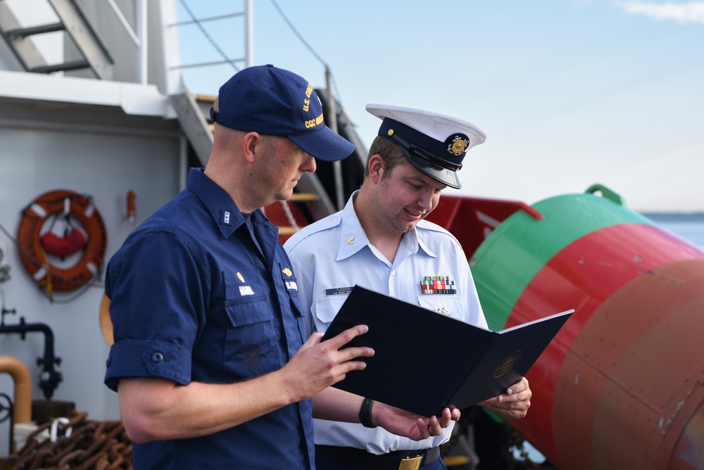 Cutterman ceremony on board the Coast Guard Cutter Marcus Hanna