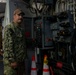 U.S. Navy Sailor Troubleshoots Elevator