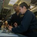 U.S. Navy Sailors Troubleshoot Testing Equipment