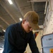 U.S. Navy Sailor Polishes Nozzle