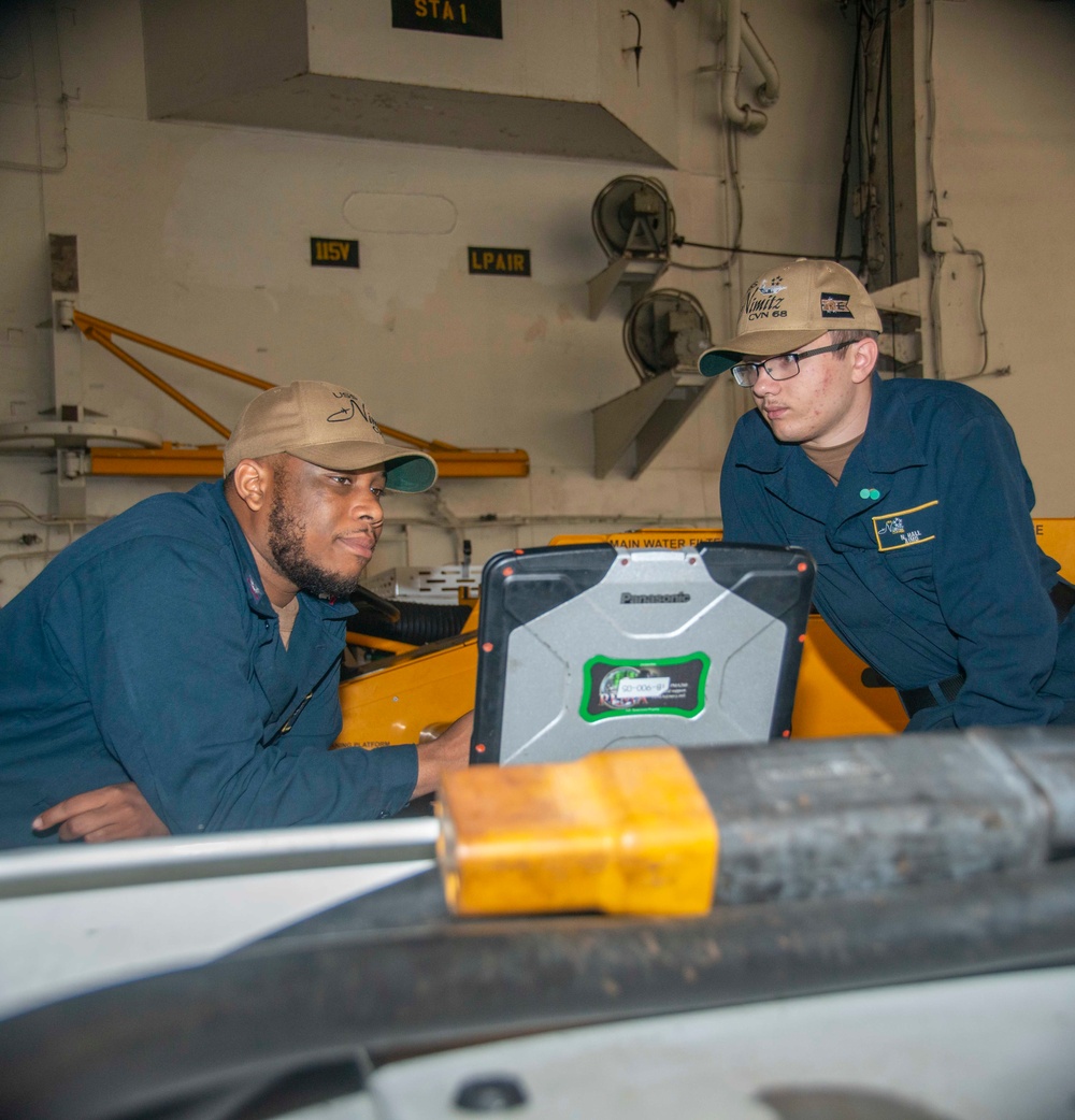 U.S. Navy Sailors Conduct Maintenance