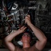 Sailor Installs Heat shielding on Jet Engine