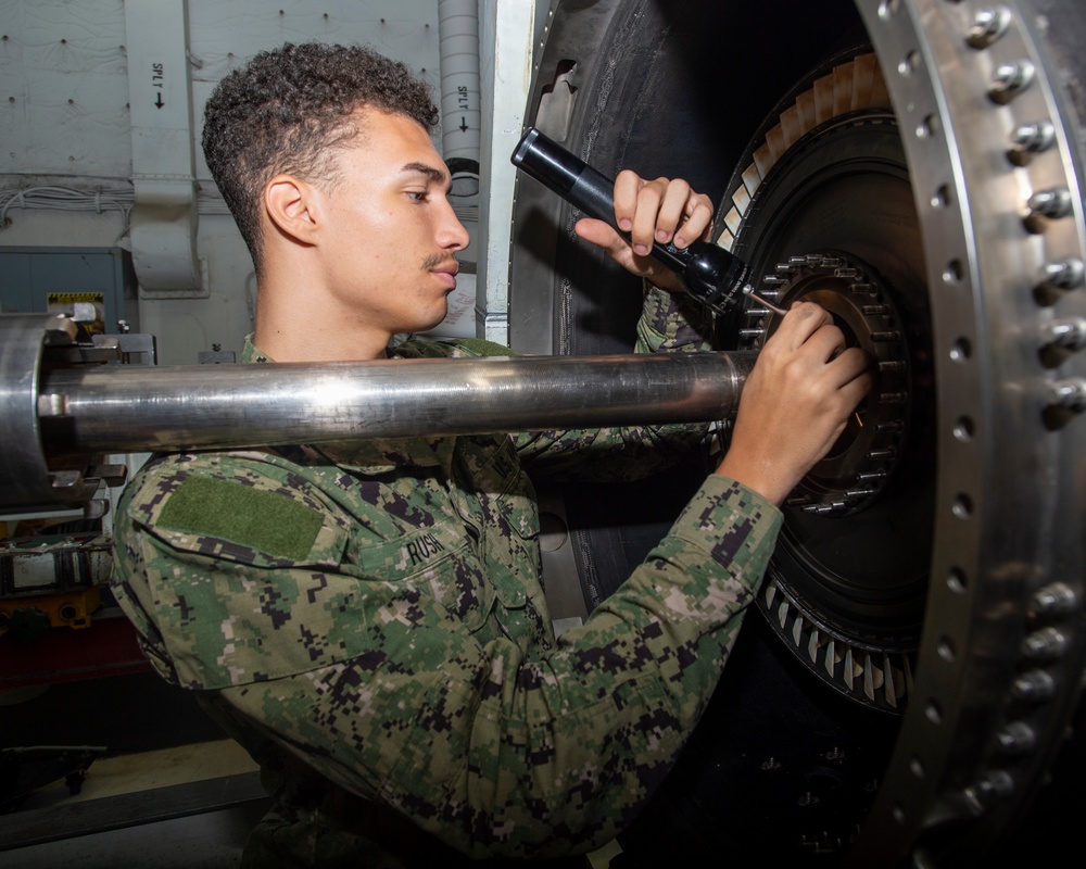 Sailor Checks Guide Pin Placement