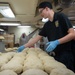 USS Ronald Reagan (CVN 76) Sailors prepare food in the bakery