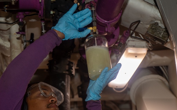USS Ronald Reagan Sailors work on JP-5 pumps