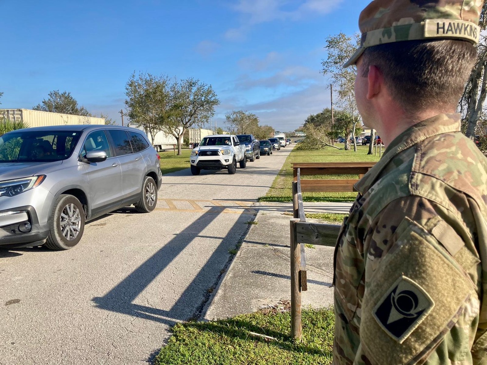 Florida National Guard Soldiers distribute food and water