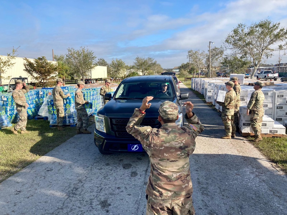 Florida National Guard Soldiers distribute food and water
