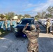 Florida National Guard Soldiers distribute food and water