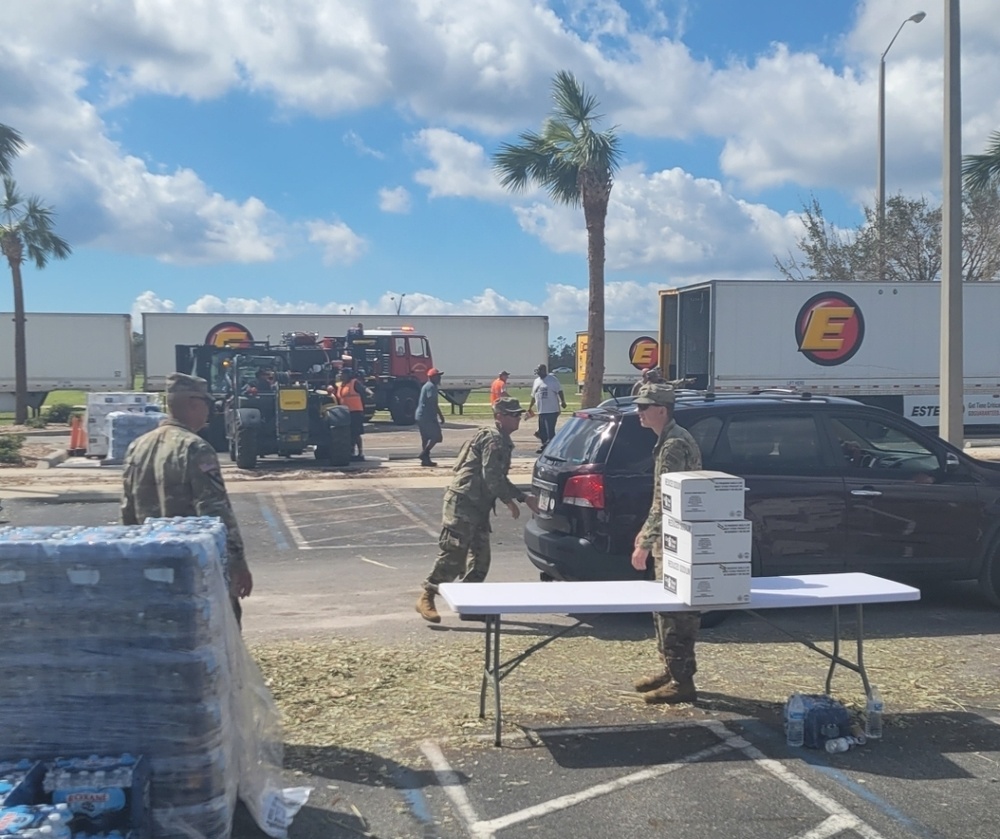 Civillians Receive Aid from National Guard and Local Officials
