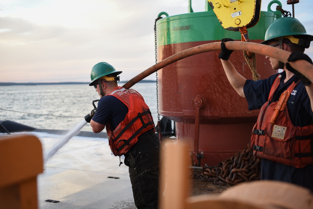 Coast Guard Cutter Marcus Hanna works buoys in the Northeast