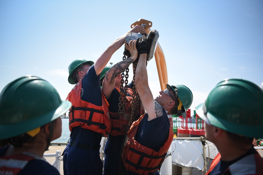 Coast Guard Cutter Marcus Hanna works buoys in the Northeast