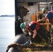 Coast Guard Cutter Marcus Hanna works buoys in the Northeast