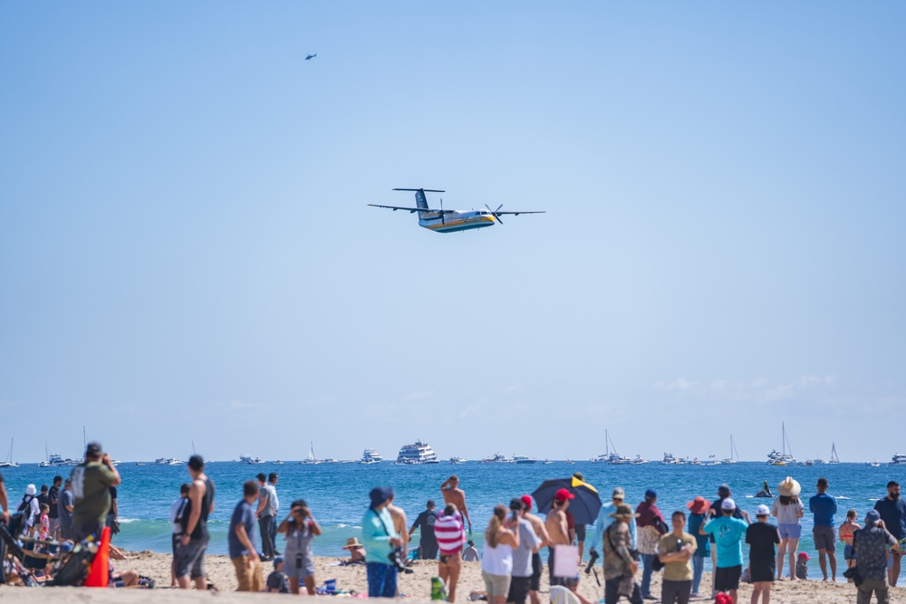 The U.S. Army Parachute Team aircraft flies at the Pacific Airshow