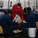 Abraham Lincoln Sailors conduct maintenance