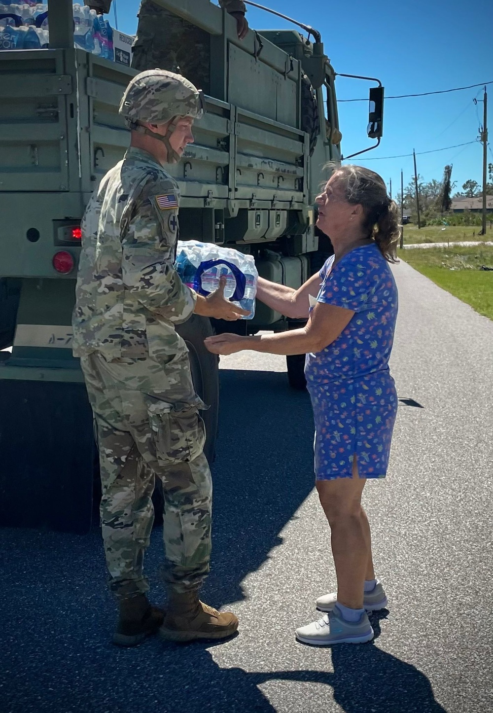 Florida National Guard Soldiers from deliver food and water