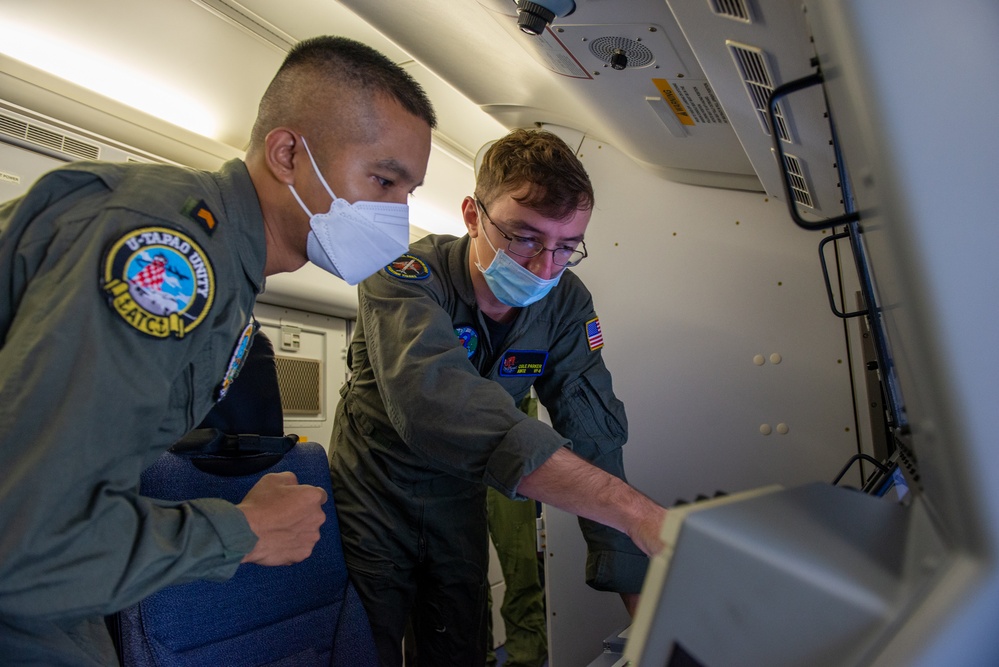 AWO2 Parker Explains P-8A Mission Systems to Royal Thai Counterparts