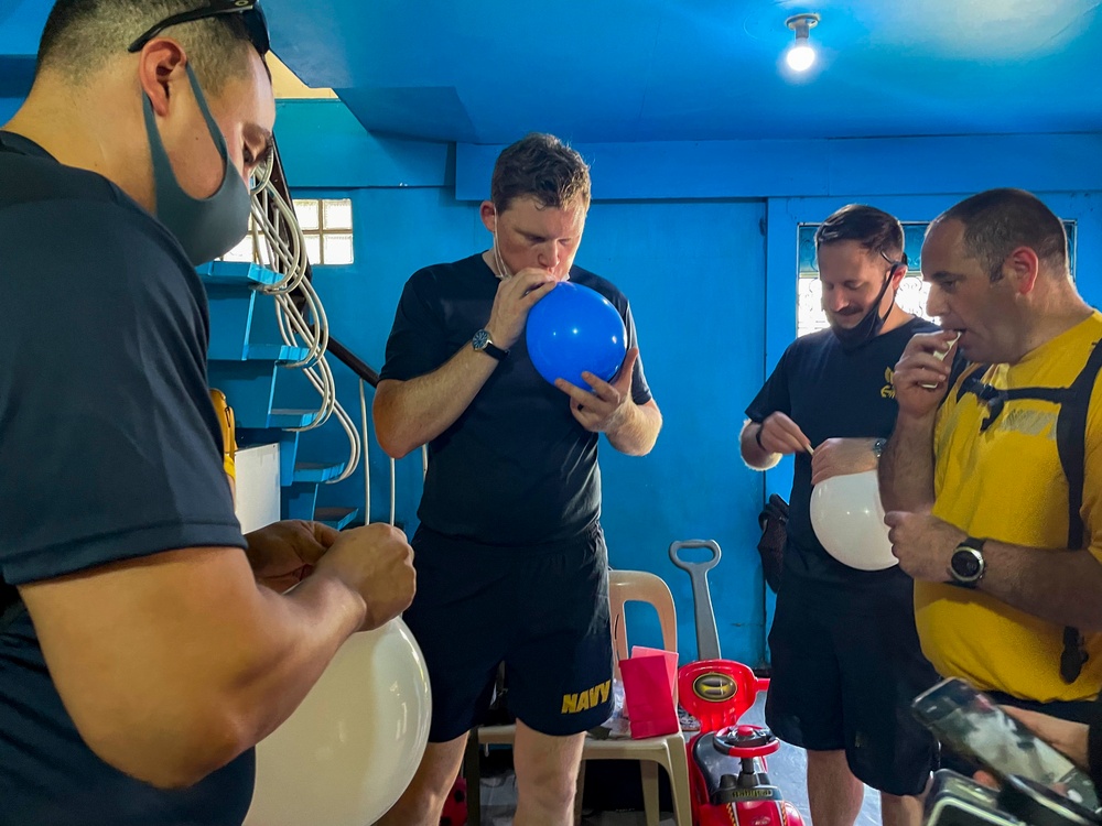Higgins Sailors Participate in Community Relations Event in Manila