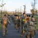 Soldiers from 1st Signal Brigade go on a ruck march for physical training in the morning.