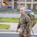 Soldiers from 1st Signal Brigade go on a ruck march for physical training in the morning.