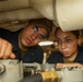 Sailors Conduct Maintenance Aboard USS Higgins