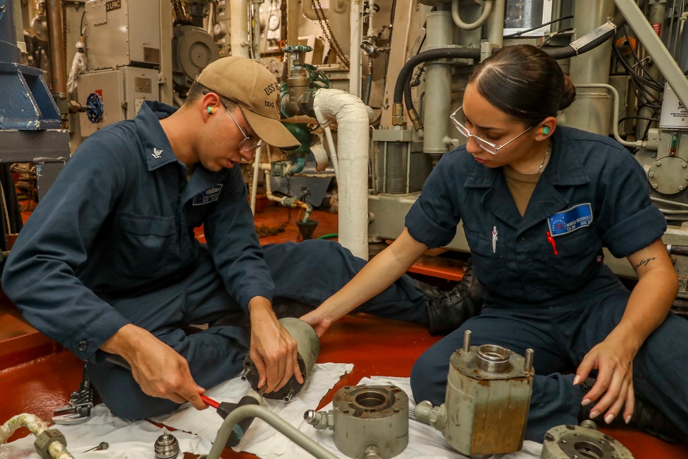 Sailors Conduct Maintenance Aboard USS Higgins