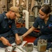 Sailors Conduct Maintenance Aboard USS Higgins