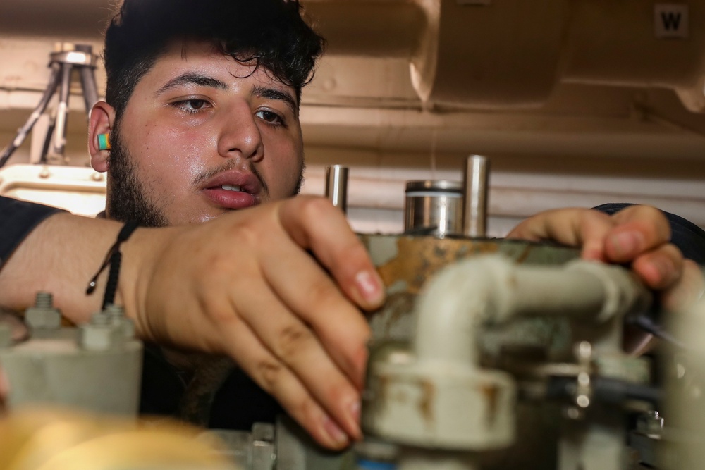 Sailors Conduct Maintenance Aboard USS Higgins