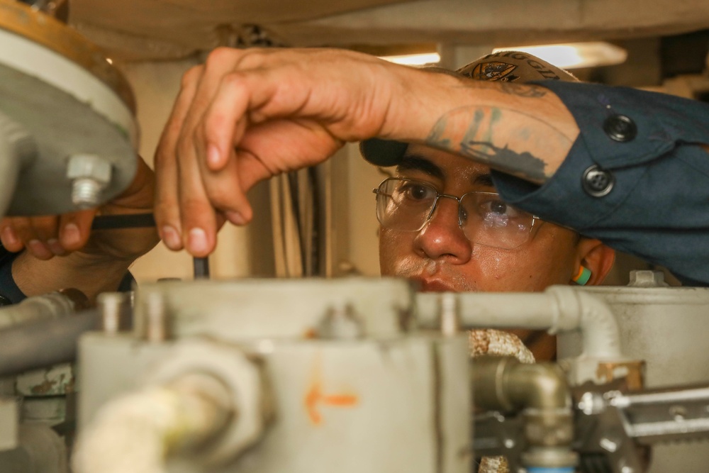 Sailors Conduct Maintenance Aboard USS Higgins