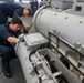 Sailors Perform Maintenance on SVTT Aboard USS Higgins