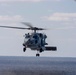 An MH-60R Sea Hawk Helicopter Patrols The Sea