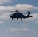 An MH-60R Sea Hawk Helicopter Patrols The Sea