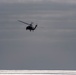 An MH-60S Sea Hawk Helicopter Patrols The Sea