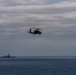 An MH-60R Sea Hawk Helicopter Patrols The Sea