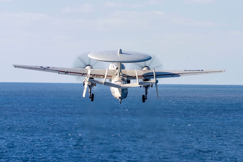 An E-2C Hawkeye Launches From The USS Nimtz (CVN 68)