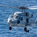 An MH-60R Sea Hawk Helicopter Patrols The Sea