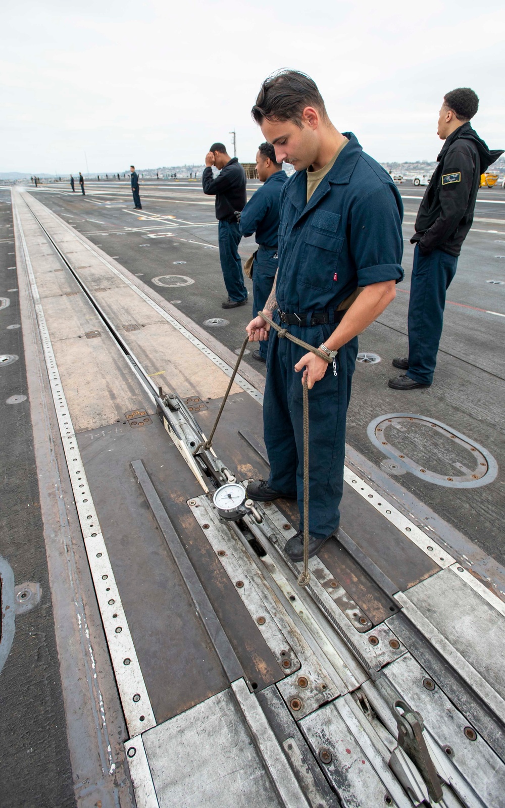 Sailor Checks Gauge