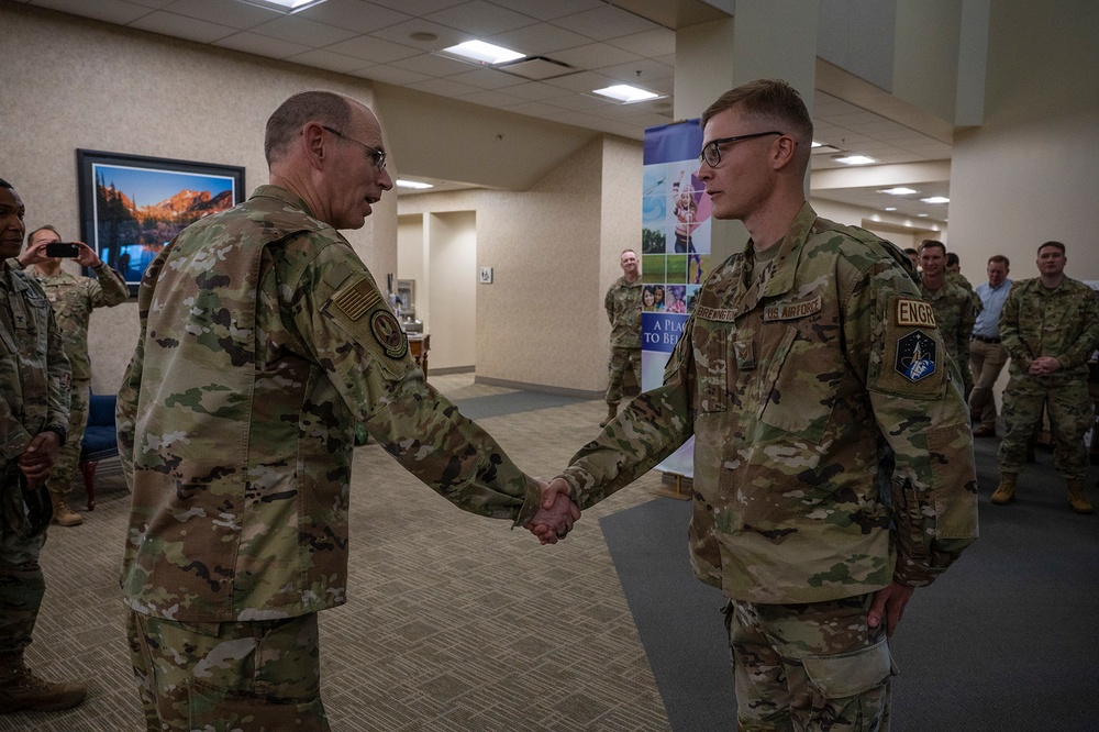 Gen. Richardson coins Airman while visiting Buckley Space Force Base