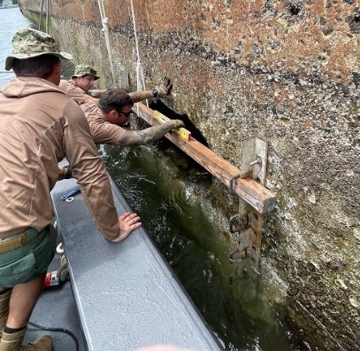 UCT 2 Repairs at Akasaki Wharf U.S. Navy Fuel Station Akasaki in Sasebo, Japan