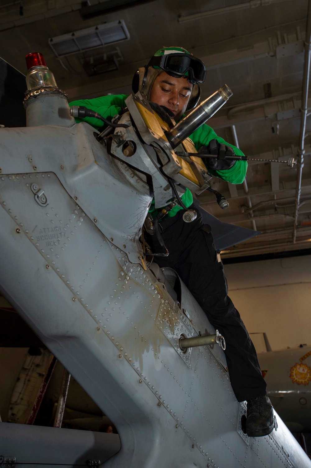 Sailor Removes Safety Wire From Rotor Nuts