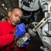 Sailor Removes Chains from Aircraft