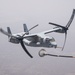 81st ERQS HC-130J conducts tactical air refueling with VMM-163 MV-22s