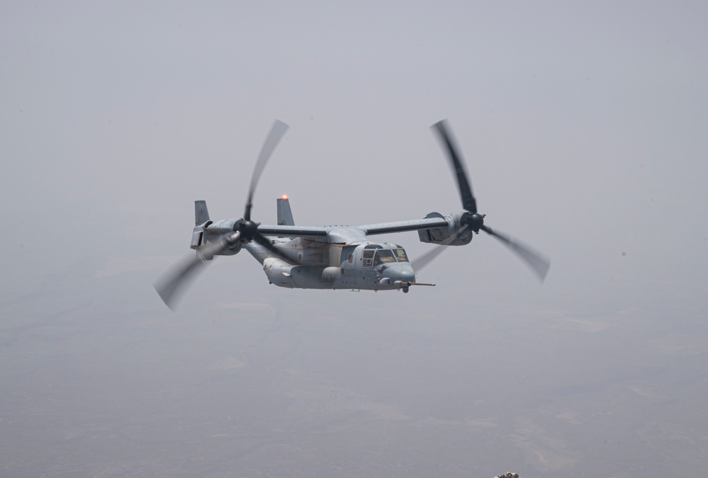 81st ERQS HC-130J conducts tactical air refueling with VMM-163 MV-22s