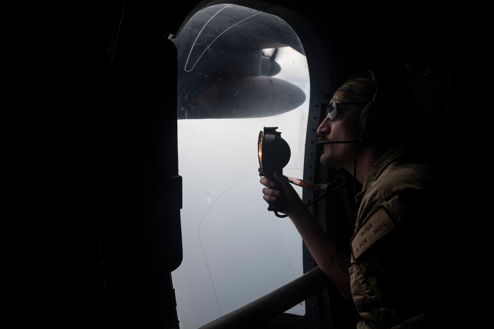 81st ERQS HC-130J conducts tactical air refueling with VMM-163 MV-22s