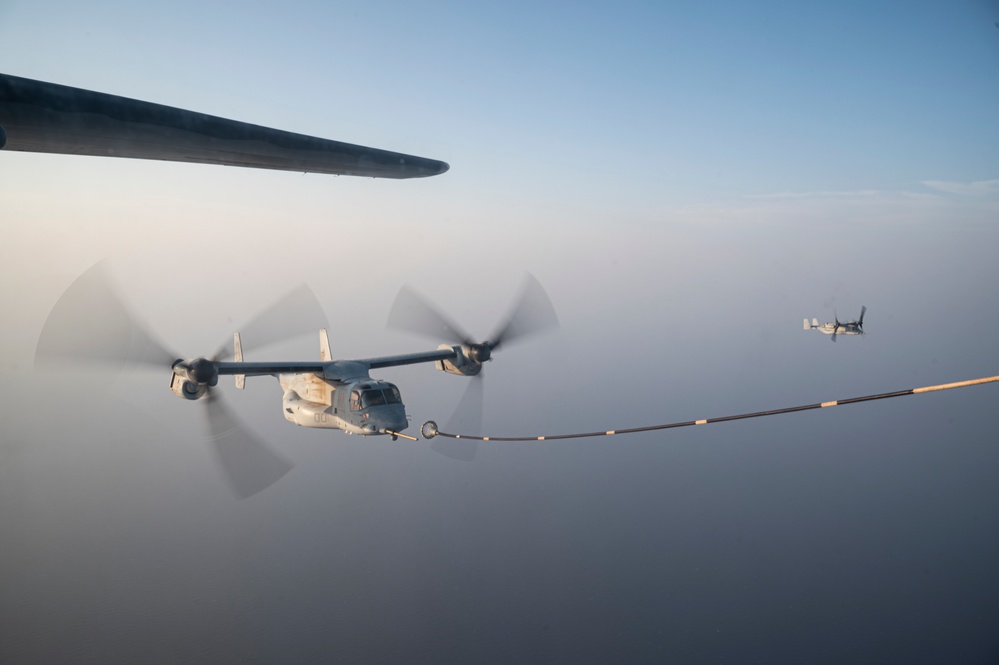 81st ERQS HC-130J conducts tactical air refueling with VMM-163 MV-22s