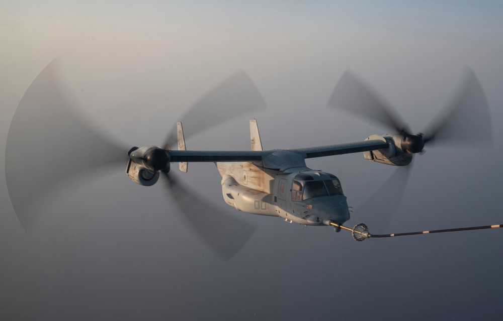 81st ERQS HC-130J conducts tactical air refueling with VMM-163 MV-22s