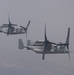 81st ERQS HC-130J conducts tactical air refueling with VMM-163 MV-22s