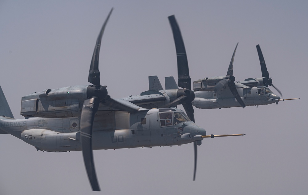 81st ERQS HC-130J conducts tactical air refueling with VMM-163 MV-22s