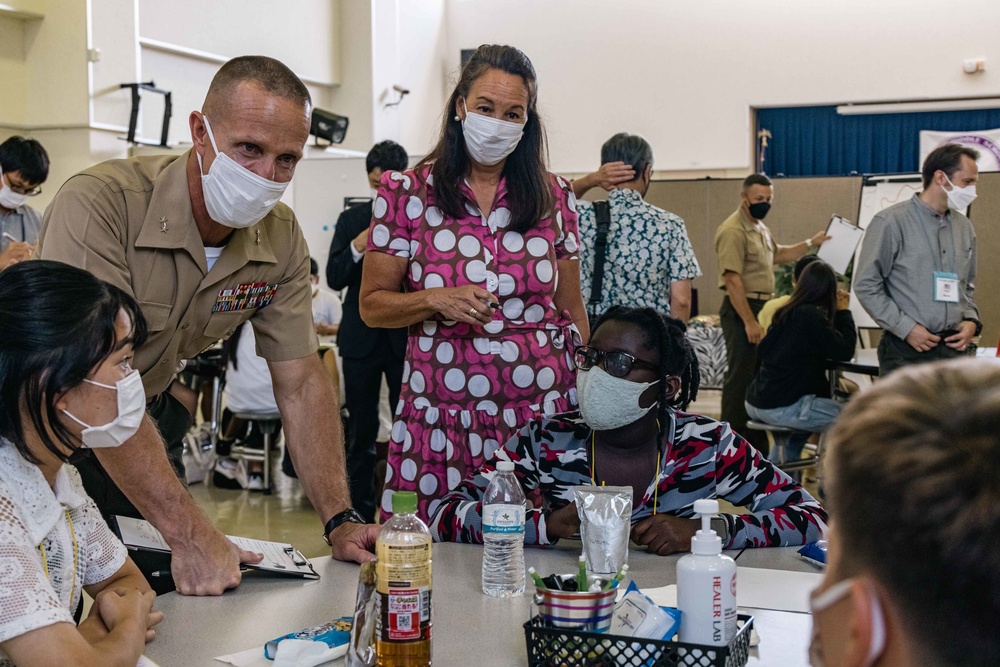 Ministry of Foreign Affairs, Department of Defense Education Activity, and US Marine Corps representatives promote a Youth Exchange Program