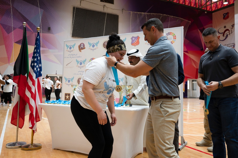 U.S. Airmen, Soldiers, and Kuwait volleyball teams compete in exhibition games for International Day of Peace