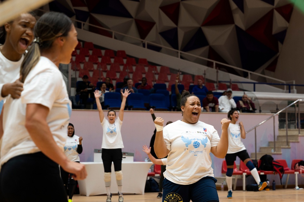 U.S. Airmen, Soldiers, and Kuwait volleyball teams compete in exhibition games for International Day of Peace